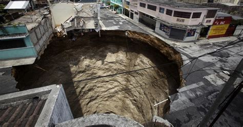 Giant sinkholes - CBS News