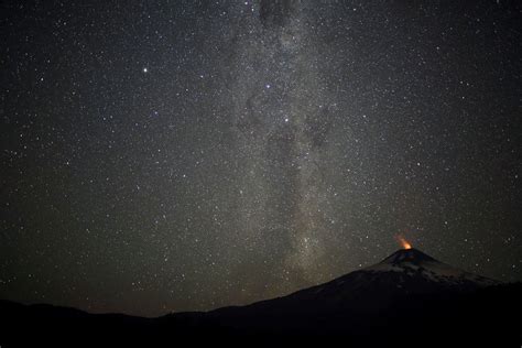 The Villarrica Volcano is seen at night from Pucon, Chile. Cristobal ...