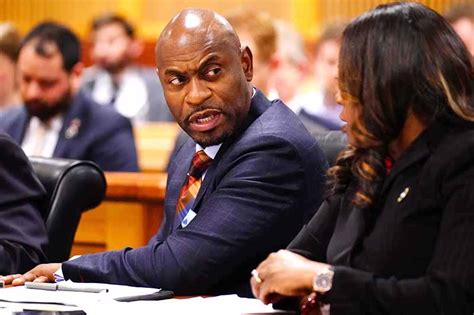 ATLANTA, GEORGIA – DECEMBER 1: Fulton County special prosecutor Nathan Wade, left, and executive ...