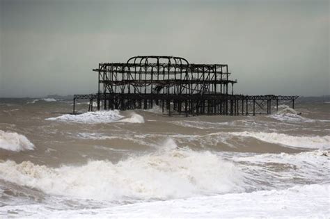 Storm tracker: Collapsed pier battered by 70mph winds as 35 areas ...