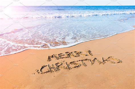 Merry christmas on the beach stock photo containing christmas and xmas | Holiday Stock Photos ...