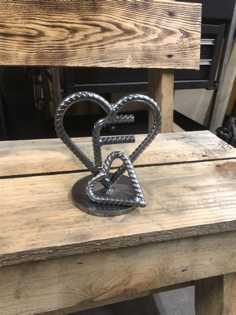 Double heart with initial | Welding art, Welding art projects, Metal art welded