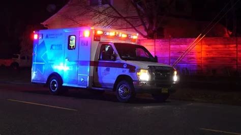 Ambulance with emergency lights flashing... | Stock Video | Pond5