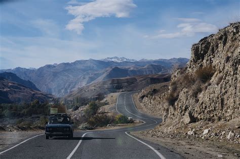 Car Running on Mountain Road · Free Stock Photo