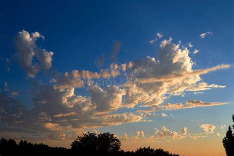 Stratocumulus Clouds at Sunset Stock Image - Image of high, meteorology ...