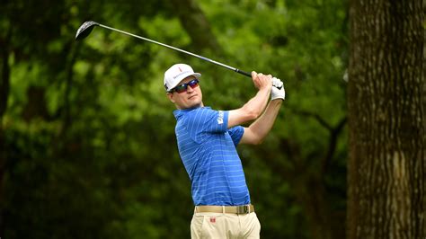 Masters champion Zach Johnson hits his tee shot on hole No. 2 during ...