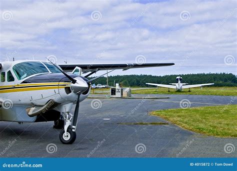 Commuter Planes in Airfield Stock Photo - Image of propellers, aircraft ...