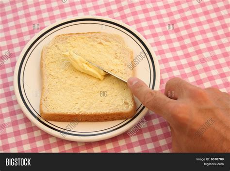 Buttering Bread Image & Photo (Free Trial) | Bigstock