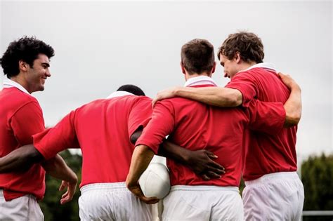 Premium Photo | Rugby players celebrating a win