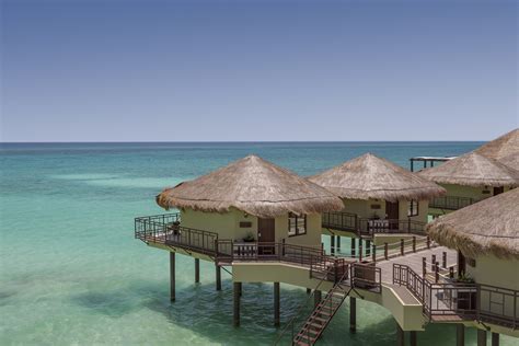 Palafitos at El Dorado Maroma: Luxury Overwater Bungalows in Mexico