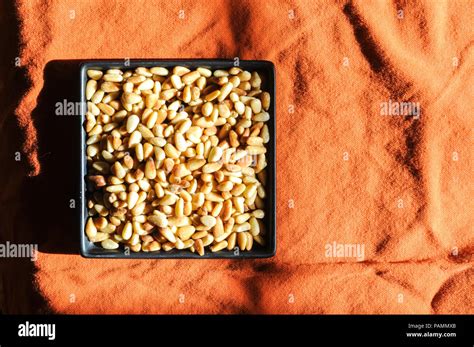 Roasted pine nuts Stock Photo - Alamy