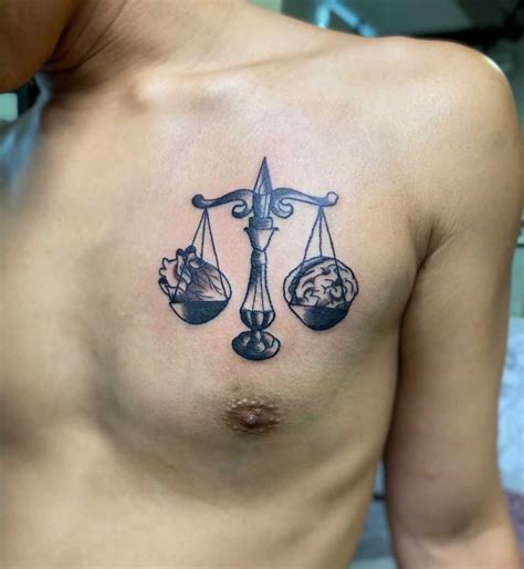 Libra scale tattoo done by... - Hibernia Tattoo Studio