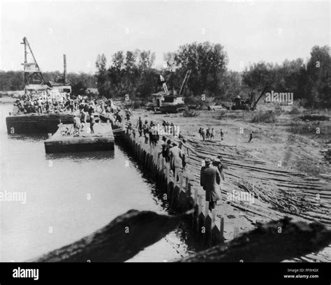 MISSISSIPPI FLOOD, 1927. /nEmergency construction of levees near Vicksburg, Mississippi, during ...