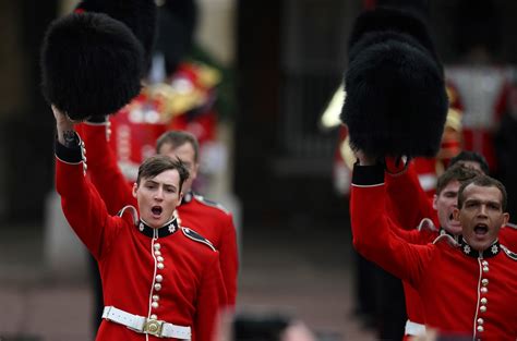 Why do royal guards wear bearskin hats? History of the helmets worn by the Grenadier Guards ...