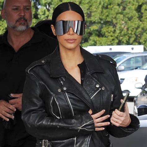 Kim Kardashian Wears Black Rick Owens Plastic Shield Sunglasses