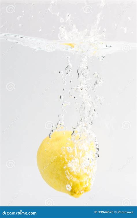 Lemon with water splash stock photo. Image of fruit, health - 33944570