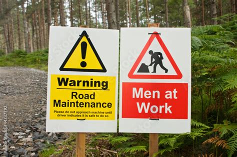 Signs Men at Work and Road Maintenance Stock Photo | Adobe Stock