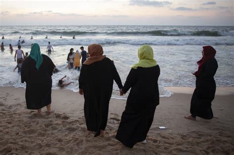 On beaches in Israel and Palestine, photos show common ground