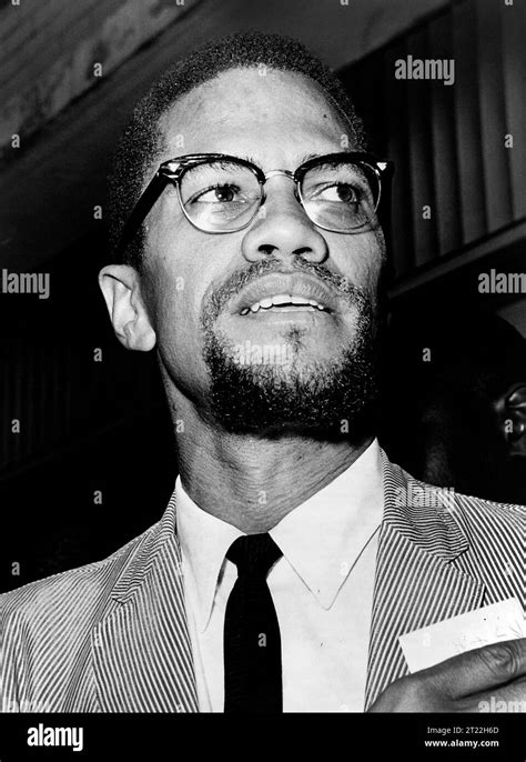 Malcolm X (1925-1965), American Muslim minister and human rights activist, head and shoulders ...