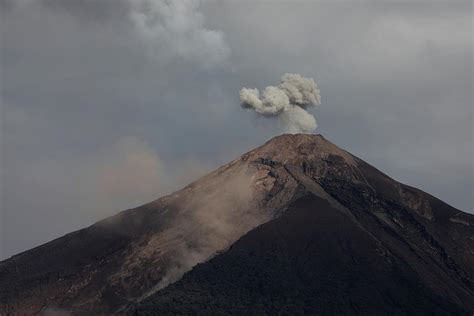 The Fuego Volcano is Seen Photograph by Jose Cabezas - Fine Art America