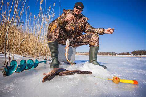 Ice Fishing Stock Photos, Pictures & Royalty-Free Images - iStock