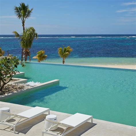 Long Beach Hotel, Mauritius — KNSTRCT | Beach hotels, Long beach hotel, Long beach resort