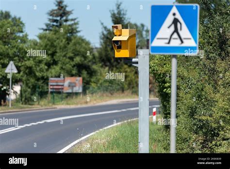 speed camera and pedestrian crossing road sign Stock Photo - Alamy