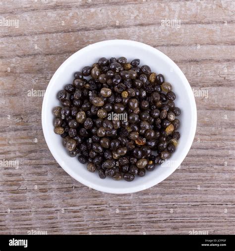 A Bowl of Papaya seeds Stock Photo - Alamy