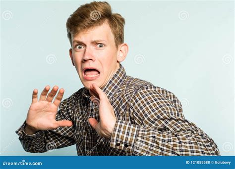 Scared Frightened Man Cowardly Comical Reaction Stock Photo - Image of shirt, copyspace: 121055588