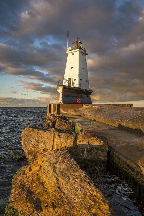 Ludington North Breakwater Lighthouse At Sunrise by Adam Romanowicz | Lighthouse, Lake ...