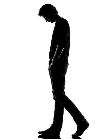 Young Man Silhouette Sad Walking Stock Photo - Download Image Now - iStock