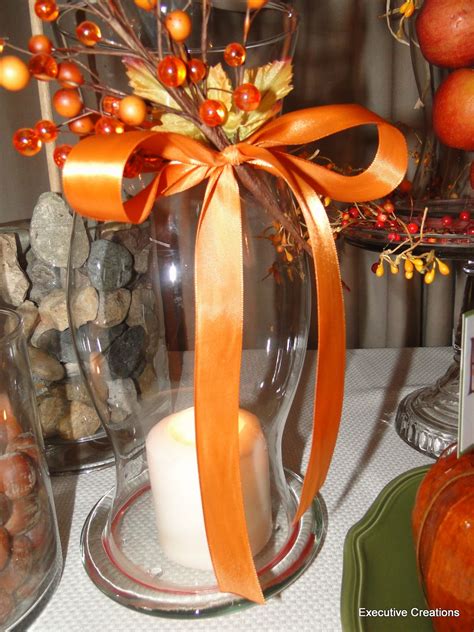 diy fall hurricane vase | Dress up hurricane lamps and vases with ribbons and floral picks ...