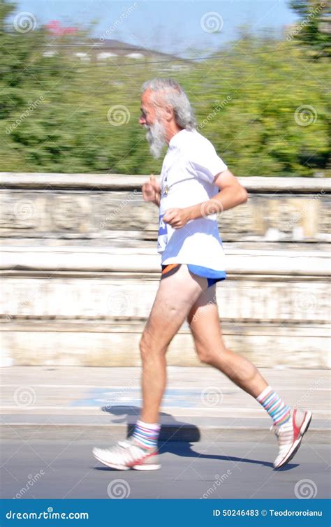 Old man running fast editorial stock photo. Image of competition - 50246483