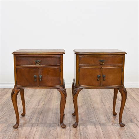 This pair of Queen Anne inspired nightstands are featured in a solid ...