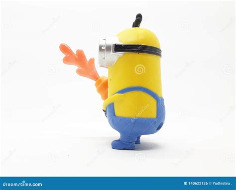 Yellow Banana Minion Toys Plastic Model from Despicable Me Movie in White Isolated Background ...