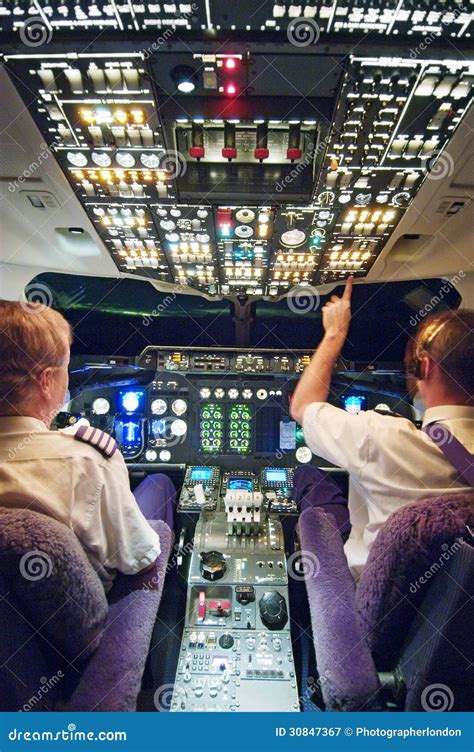 Two Pilots in Aeroplane Cockpit Editorial Photography - Illustration of aeroplane, adult: 30847367