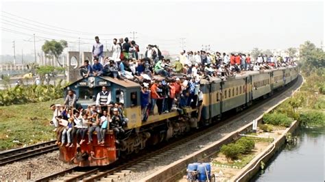 Risky Train Journey on Brahmaputra Express Train of Bangladesh Railway at the day of Biswa ...