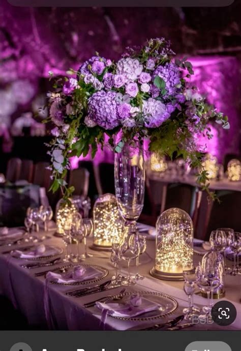Floral and Glass Light Table Centerpieces in 2024 | Diy wedding ...