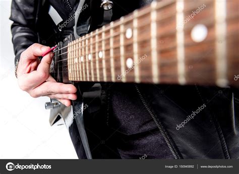 Rocker with electric guitar — Stock Photo © DmitryPoch #150945892