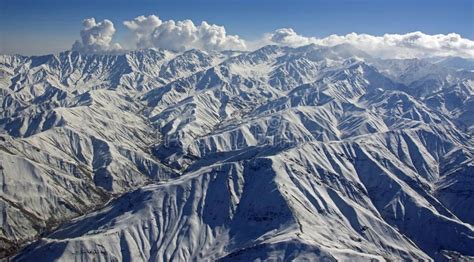 Rugged Afghanistan Mountain Range. A majestic snow covered mountain ...