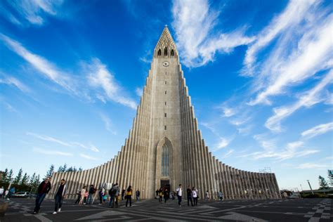 People walking into Hallgrimskirkja Church in Reykjavik cruise port in ...