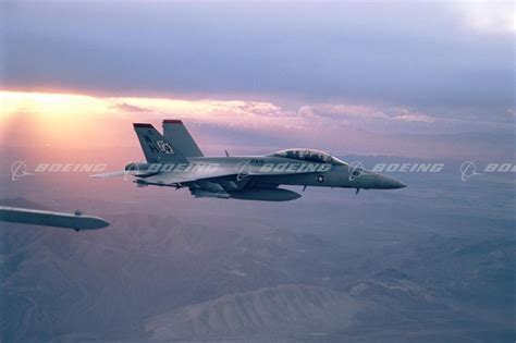 Boeing Images - F/A-18E/F Super Hornet in Flight at Sunset