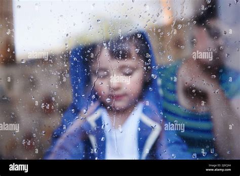 Child in wet clothes hi-res stock photography and images - Alamy