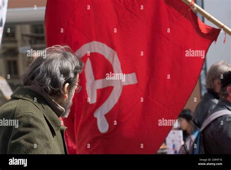 Red hammer and sickle flag, symbol for the communist movement Stock Photo - Alamy