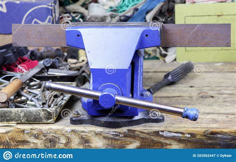 Blue Vise on a Wooden Table. Bench Tools Stock Image - Image of handle, repair: 203562447