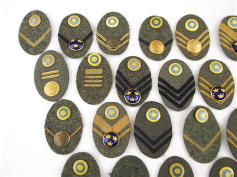 SWEDEN - 30 SWEDISH ARMY RANK OVAL BADGES Swedish Army rank insignia. (30)