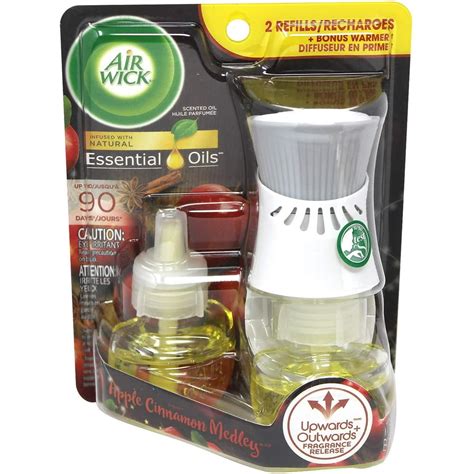 Air Wick Plug in Scented Oil Starter Kit (Warmer + 2 Refills), Apple ...