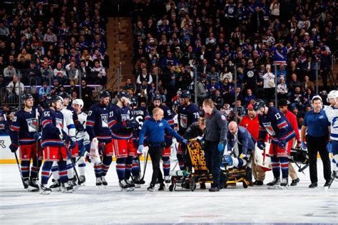 Lightning's Mikhail Sergachev stretchered off with leg injury