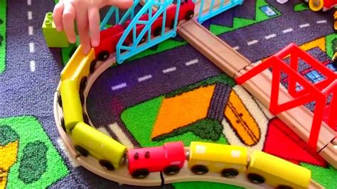 Fun by train and cars on the railroad crossing. Toys trains for children - YouTube