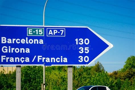 Sign on the Side of a Road To Barcelona, Distance Shown To Girona and ...